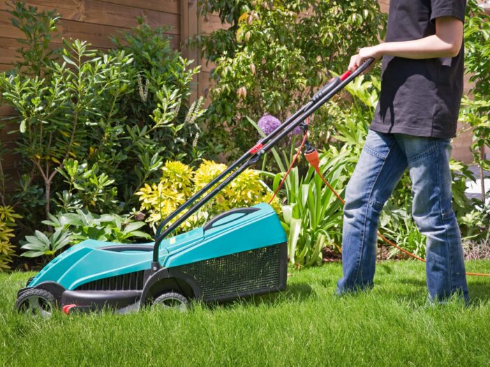 Canva-Boy-mowing-the-lawn-scaled-01